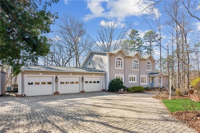 view of front of property featuring a garage