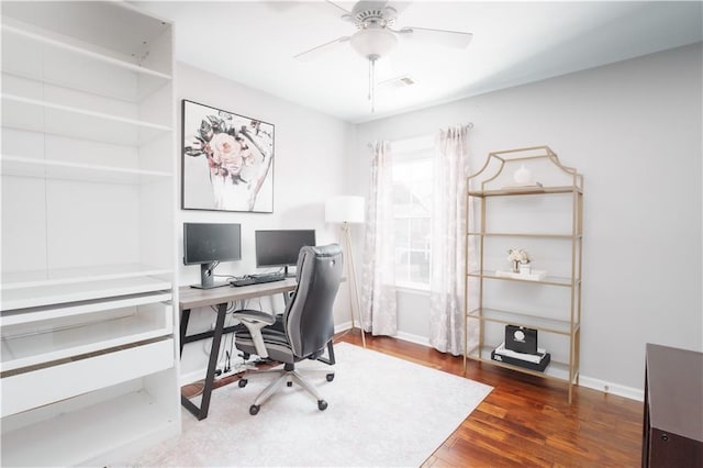 office featuring dark wood-type flooring and ceiling fan