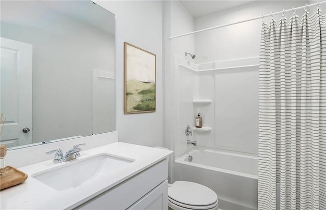 full bathroom with vanity, toilet, and shower / tub combo