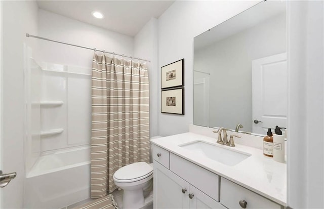 full bathroom with toilet, shower / bath combo, vanity, and tile patterned floors