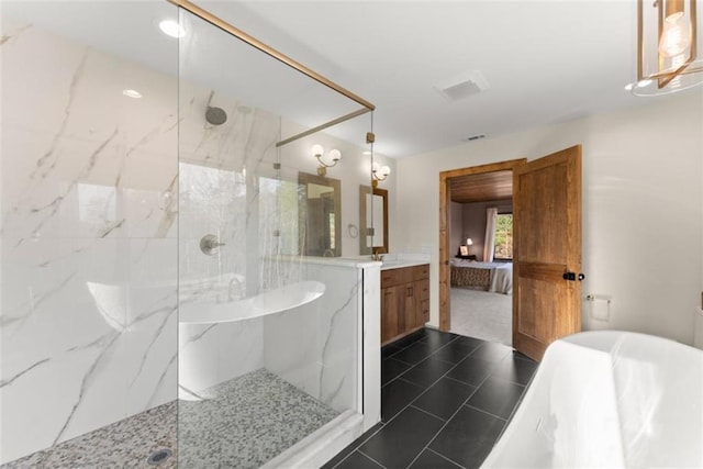 bathroom featuring tile patterned floors, vanity, and separate shower and tub