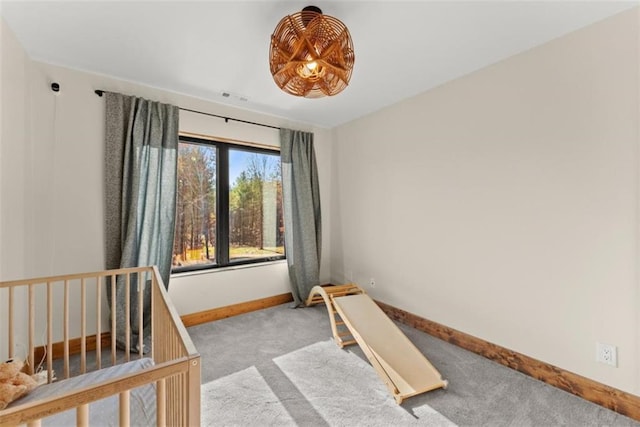 bedroom with light colored carpet