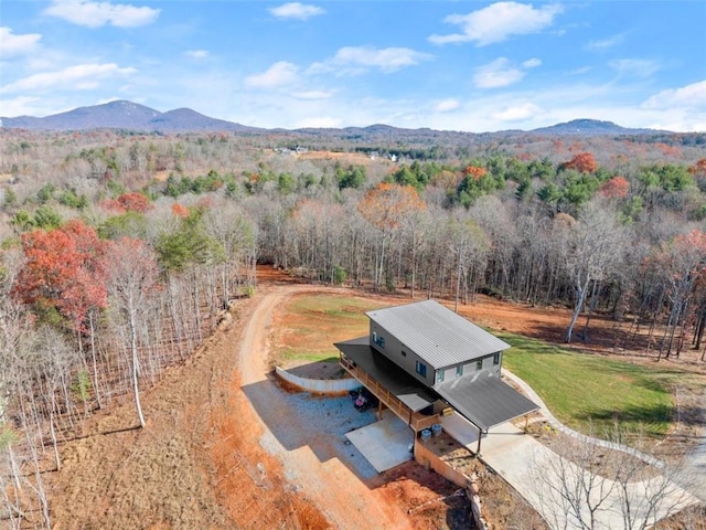 birds eye view of property with a mountain view