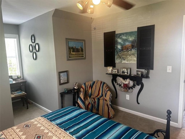 bedroom featuring ceiling fan and carpet floors