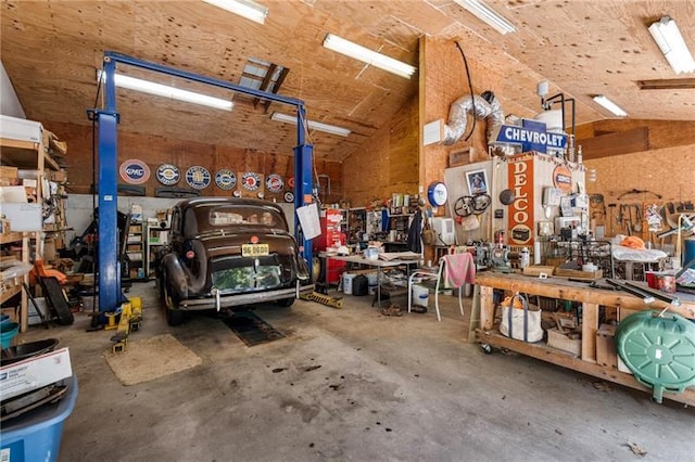 garage with a workshop area