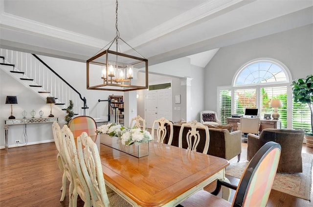 1473 Cardova Pointe, Dunwoody, GA 30338 - dining room featuring stairs, wood finished floors, a chandelier, and vaulted ceiling