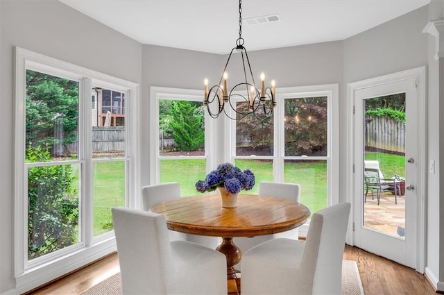 1473 Cardova Pointe, Dunwoody, GA 30338 - dining area featuring a chandelier and light wood-type flooring