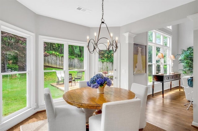 1473 Cardova Pointe, Dunwoody, GA 30338 - dining space featuring a chandelier and wood finished floors