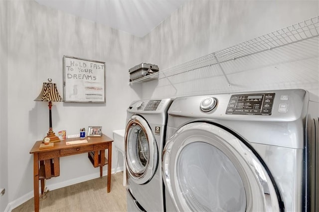 1473 Cardova Pointe, Dunwoody, GA 30338 - laundry area with washing machine and dryer and light wood-style flooring