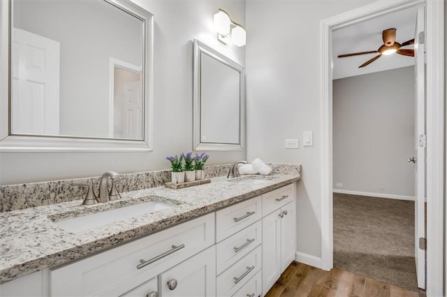 1473 Cardova Pointe, Dunwoody, GA 30338 - full bathroom with double vanity, ceiling fan, and wood finished floors