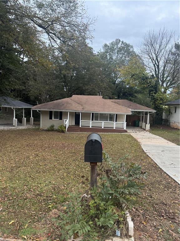 single story home with a carport