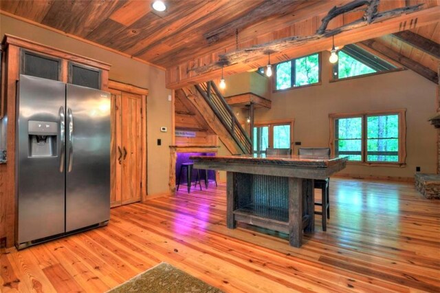 179 Huckleberry Ln, Ellijay, GA 30536 - kitchen with stainless steel fridge, wooden ceiling, hardwood / wood-style floors, and lofted ceiling