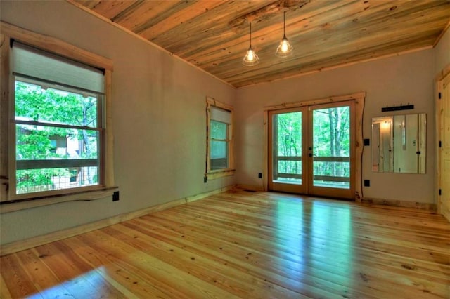 179 Huckleberry Ln, Ellijay, GA 30536 - spare room featuring french doors, wooden ceiling, hardwood / wood-style flooring, and baseboards