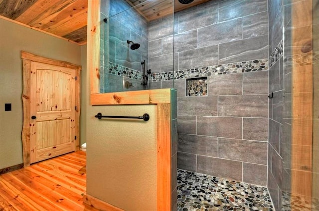 179 Huckleberry Ln, Ellijay, GA 30536 - full bath with a walk in shower, wood finished floors, and wooden ceiling