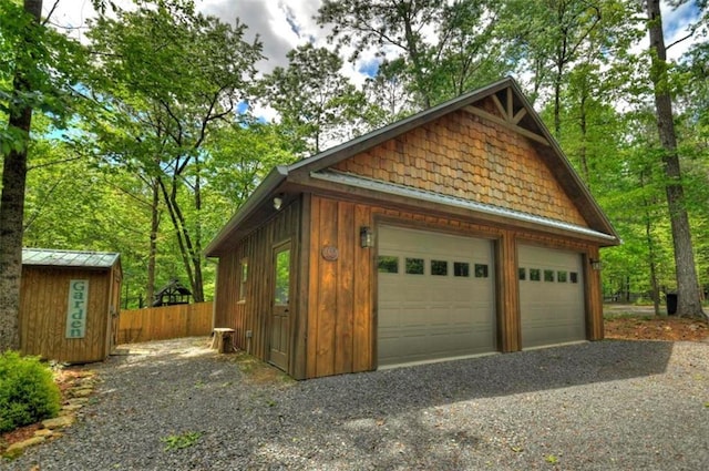 179 Huckleberry Ln, Ellijay, GA 30536 - detached garage featuring fence