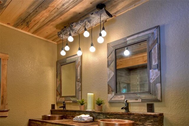 179 Huckleberry Ln, Ellijay, GA 30536 - bathroom featuring a textured wall and double vanity