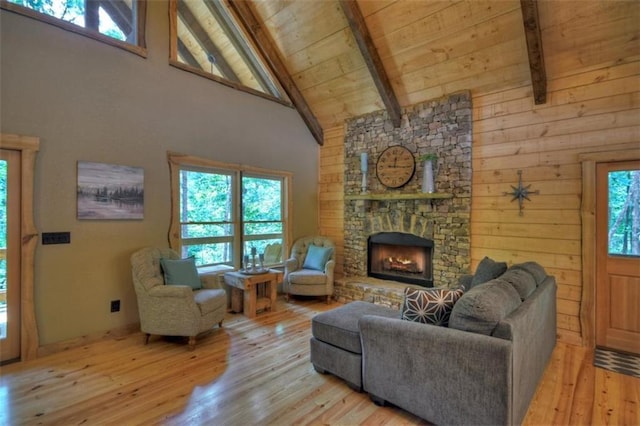 179 Huckleberry Ln, Ellijay, GA 30536 - living room featuring beam ceiling, light wood-type flooring, healthy amount of natural light, wood ceiling, and high vaulted ceiling