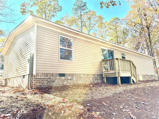 view of property exterior featuring crawl space