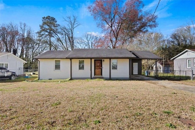 single story home featuring crawl space, a carport, a front yard, and fence