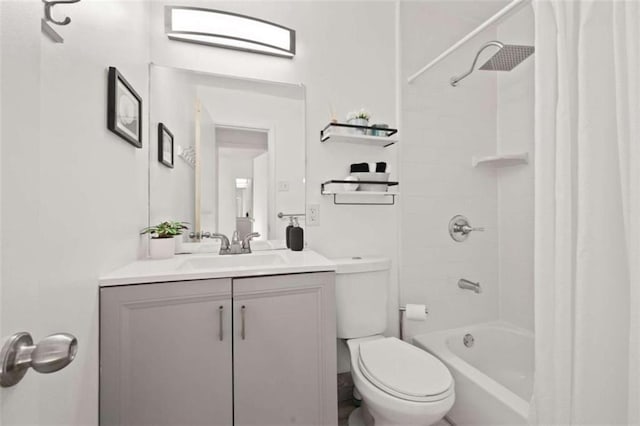 full bath with vanity, shower / bath combination with curtain, and toilet