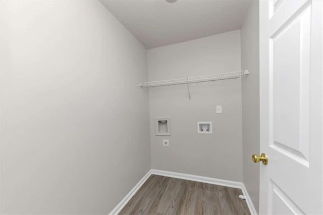 washroom with washer hookup, hookup for an electric dryer, and hardwood / wood-style floors