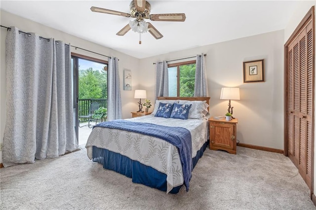 bedroom with light carpet, access to outside, ceiling fan, and a closet