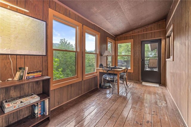 sunroom / solarium with lofted ceiling