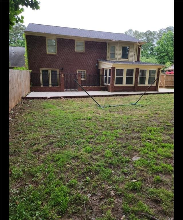 6210 Douglas Manor Ct, Douglasville, GA 30134 - back of house with brick siding and a patio