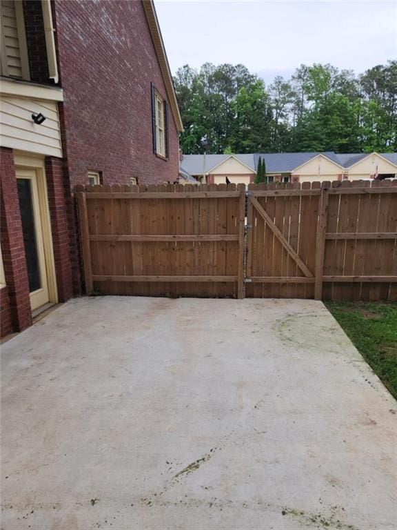 6210 Douglas Manor Ct, Douglasville, GA 30134 - view of patio featuring a gate