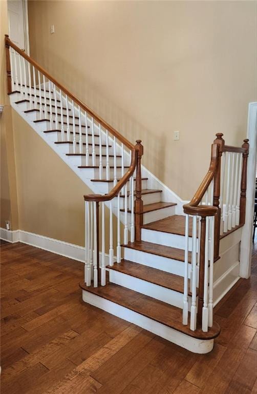 6210 Douglas Manor Ct, Douglasville, GA 30134 - staircase featuring hardwood / wood-style flooring and baseboards