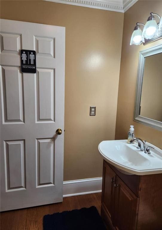 6210 Douglas Manor Ct, Douglasville, GA 30134 - bathroom featuring vanity, wood finished floors, and baseboards