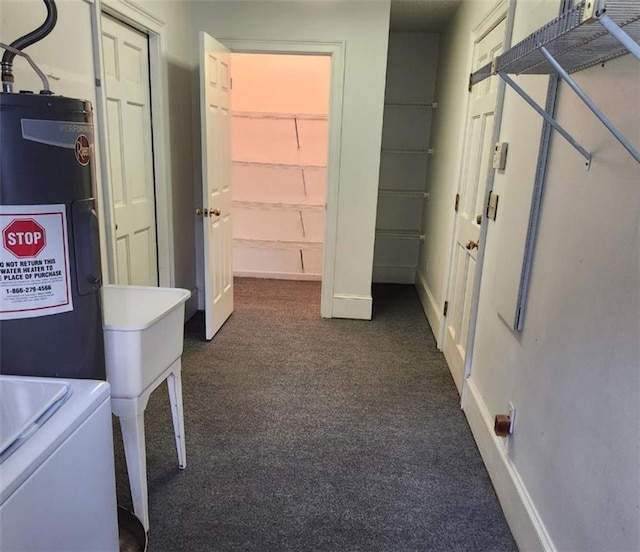 6210 Douglas Manor Ct, Douglasville, GA 30134 - washroom with dark carpet, water heater, and baseboards