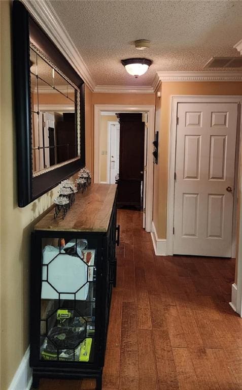 6210 Douglas Manor Ct, Douglasville, GA 30134 - corridor featuring hardwood / wood-style floors, ornamental molding, baseboards, and a textured ceiling