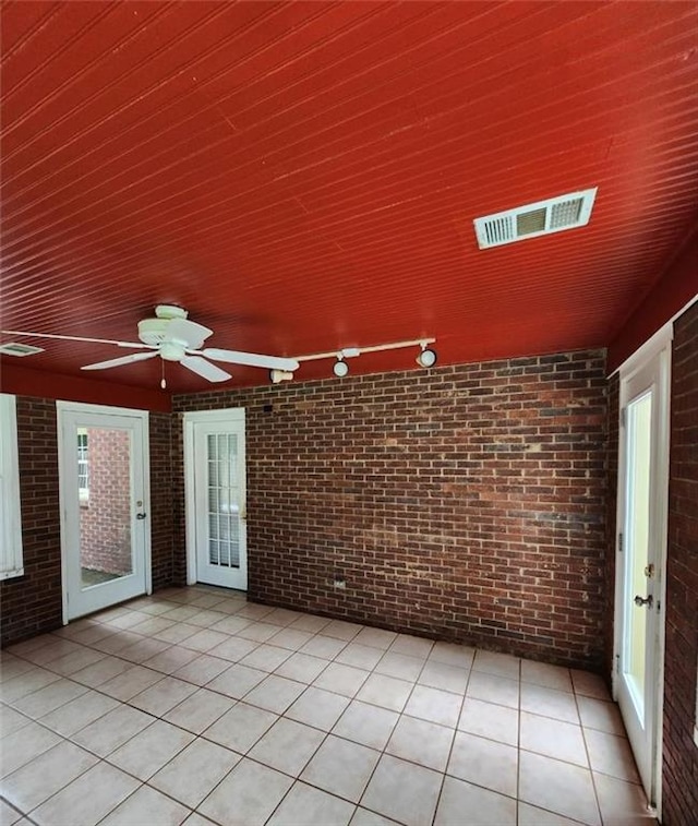 6210 Douglas Manor Ct, Douglasville, GA 30134 - unfurnished sunroom featuring track lighting