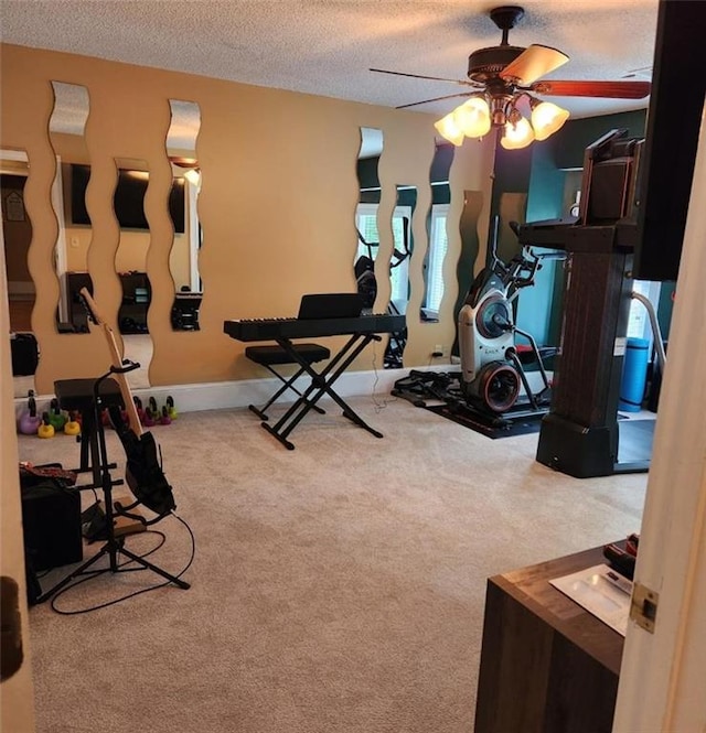 6210 Douglas Manor Ct, Douglasville, GA 30134 - workout room with carpet flooring, a textured ceiling, and ceiling fan