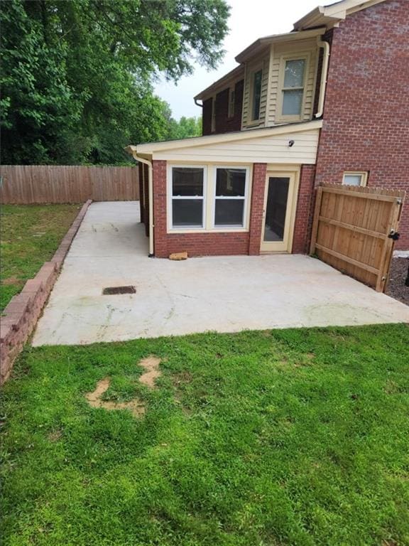 6210 Douglas Manor Ct, Douglasville, GA 30134 - back of house featuring a patio area and brick siding