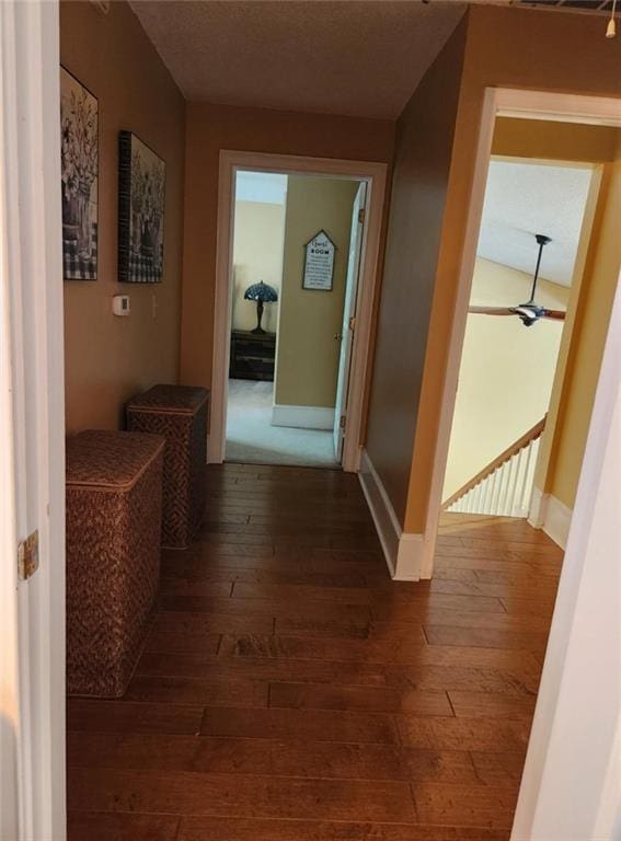 6210 Douglas Manor Ct, Douglasville, GA 30134 - hall with dark wood-style flooring and baseboards