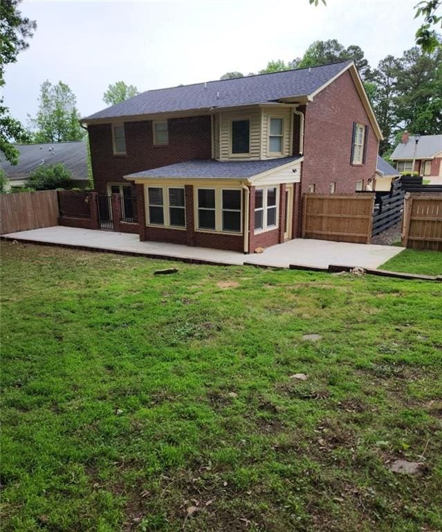 6210 Douglas Manor Ct, Douglasville, GA 30134 - rear view of property with a patio