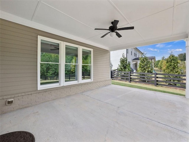 view of patio featuring ceiling fan