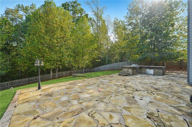 view of patio with a fenced backyard