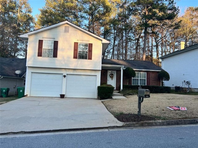 view of front of home with a garage