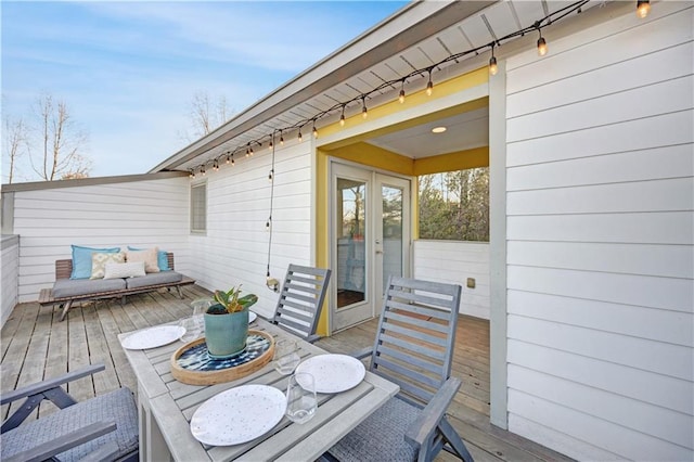 wooden terrace featuring french doors