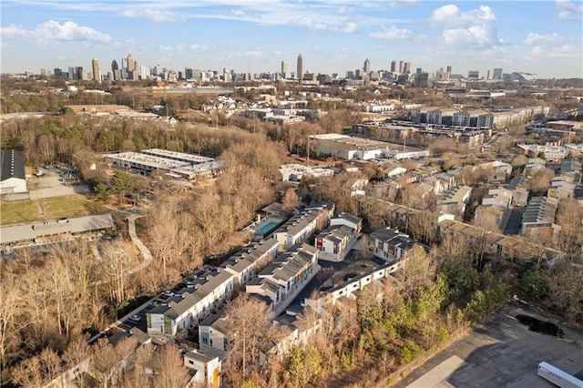 birds eye view of property featuring a city view