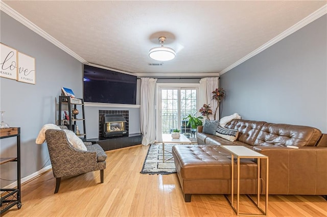 970 Sidney Marcus Blvd Unit 1217, Atlanta, GA 30324 - living area with visible vents, crown molding, and wood finished floors