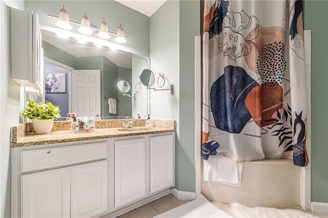 970 Sidney Marcus Blvd Unit 1217, Atlanta, GA 30324 - bathroom featuring a shower with shower curtain, a washtub, vanity, tile patterned flooring, and baseboards