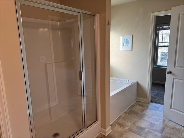 bathroom with tile patterned flooring and toilet