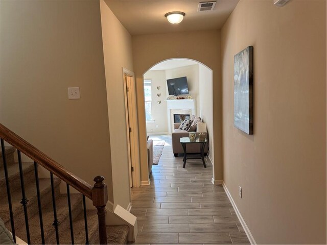 hallway featuring hardwood / wood-style flooring