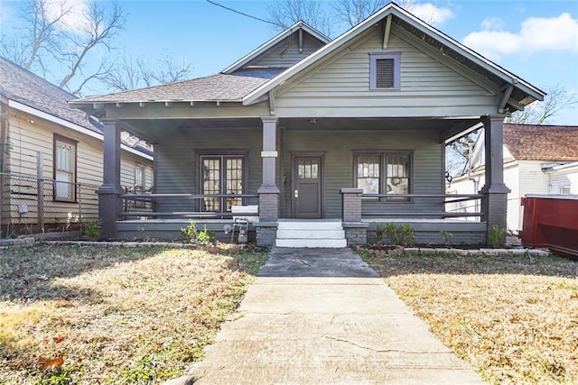 view of front of home featuring a porch and a front yard