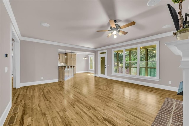 4424 Longmead Rd, Flowery Branch, GA 30542 - unfurnished living room with light wood finished floors, a ceiling fan, and ornamental molding