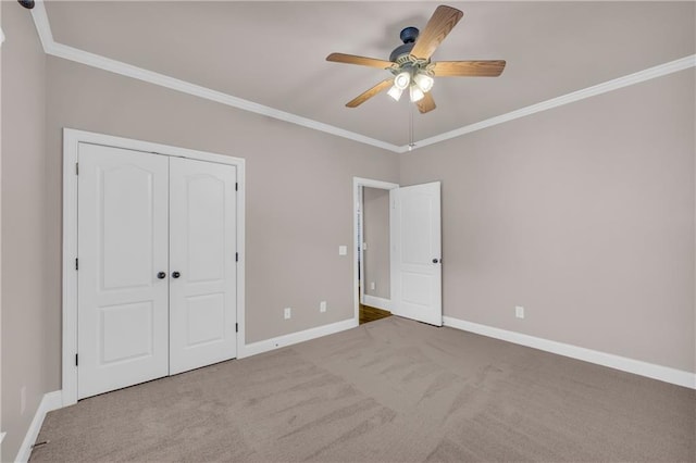 4424 Longmead Rd, Flowery Branch, GA 30542 - unfurnished bedroom featuring ornamental molding, carpet floors, a closet, and ceiling fan